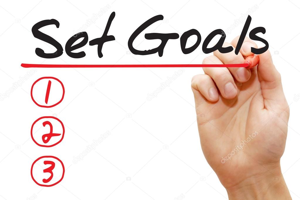 Hand writing Set Goals List, business concep