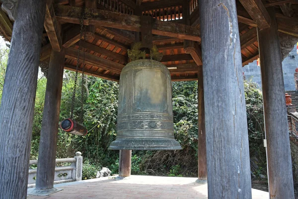 Buddhist bell tower with Traditional Bonshou Bell on a sunny day