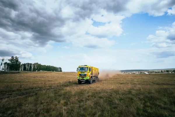 rally truck MAN rides a dusty road