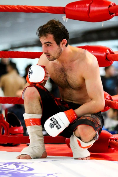 Mixed martial arts fighter in the corner of the ring