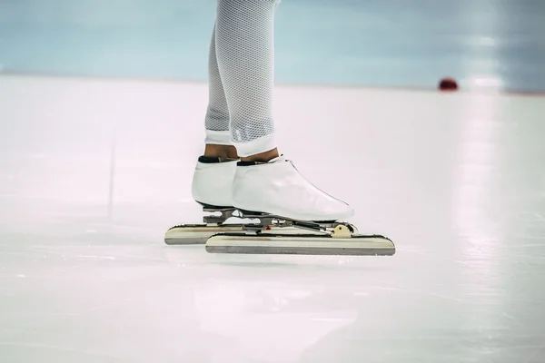 closeup feet girl speed skaters