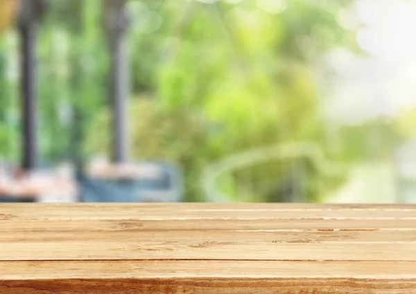 Worn table and blur background — Stock Photo, Image