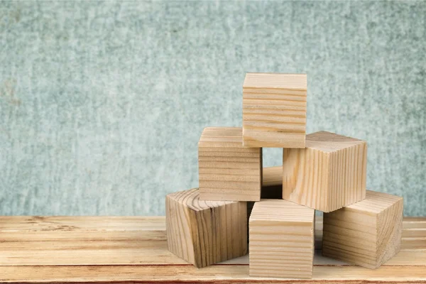 Cubos de madeira no fundo — Fotografia de Stock