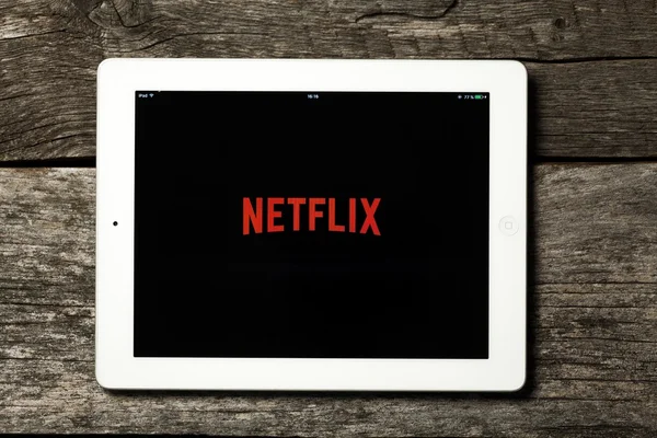 Netflix on white Apple iPad. — Stock Photo, Image