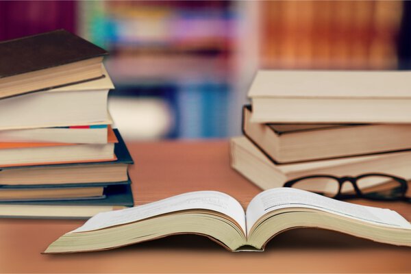 books on  wooden table