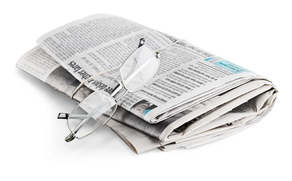 Newspapers with reading glasses. — Stock Photo, Image