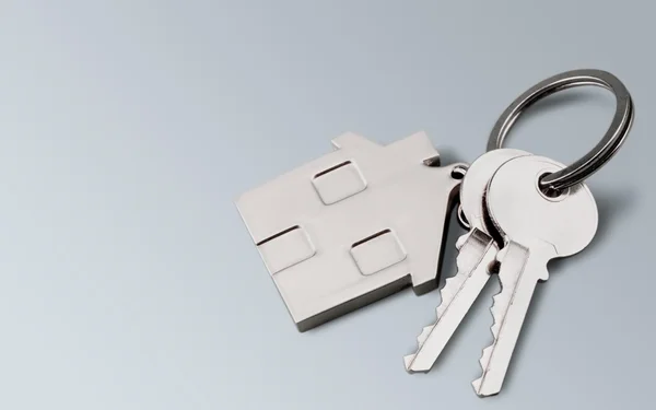 Klíče od domu číslo domu — Stock fotografie