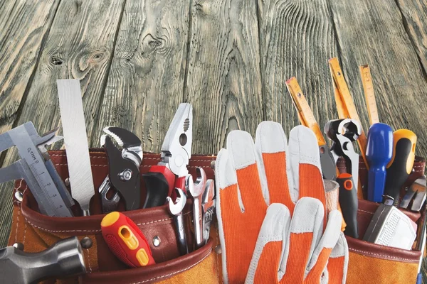 Gloves and tools on  background — Stock Photo, Image