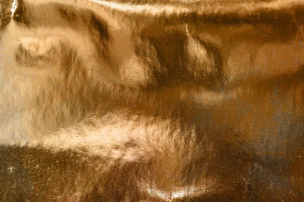 Неровная золотая поверхность — стоковое фото