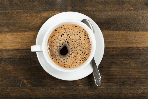 Kaffeetasse auf Hintergrund — Stockfoto