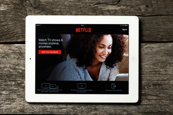 Netflix on white Apple iPad. — Stock Photo, Image