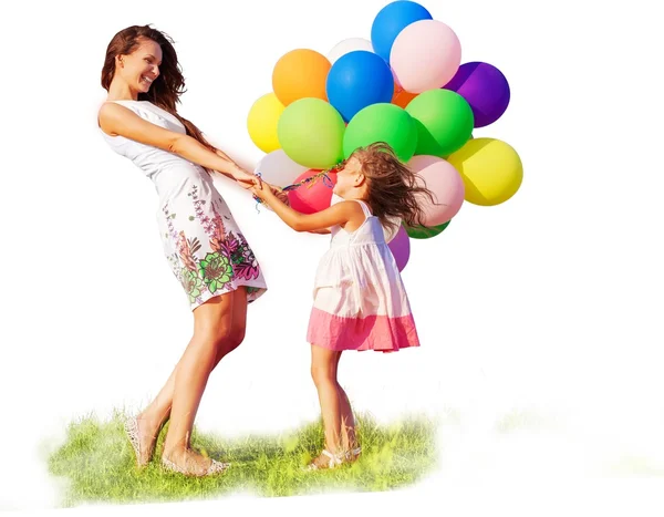 Mãe com filha com balões coloridos — Fotografia de Stock