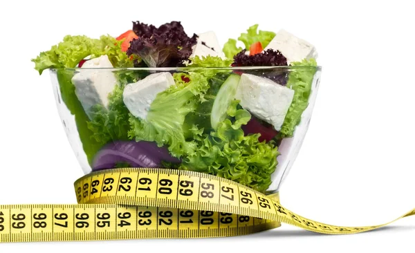 Salad and tape measure — Stock Photo, Image