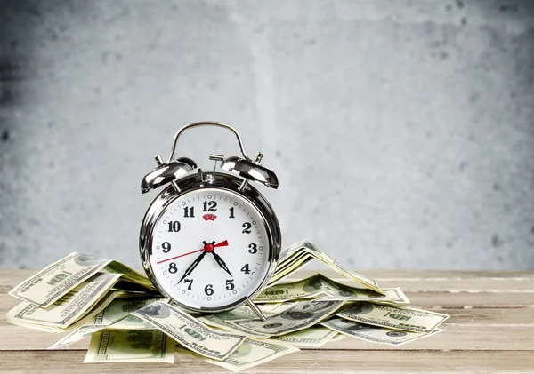 Retro alarm clock and money — Stock Photo, Image