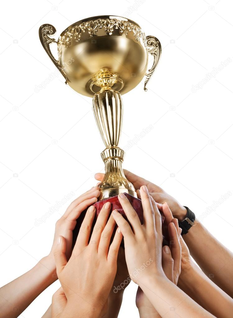 Hand Holding Trophy