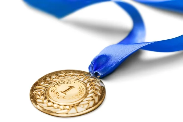 Золотая медаль с лентой — стоковое фото