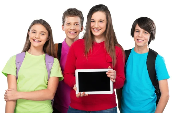 Freundliche Schulkinder mit Tablet-PC — Stockfoto