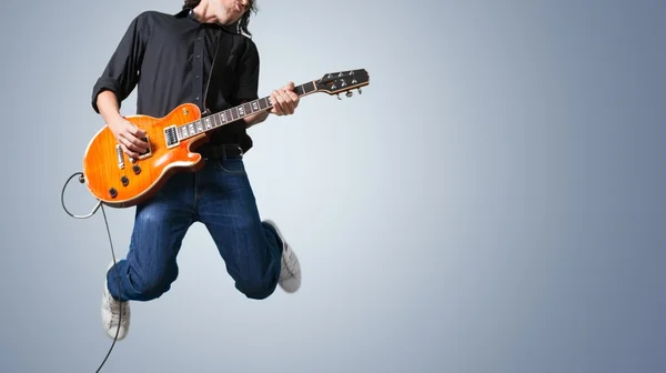 Guitarist playing music — Stock Photo, Image