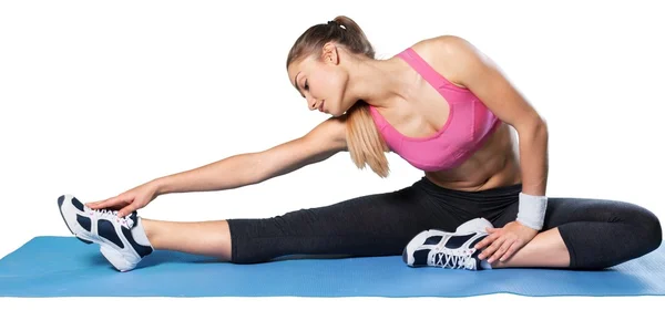 Mujer joven haciendo yoga —  Fotos de Stock