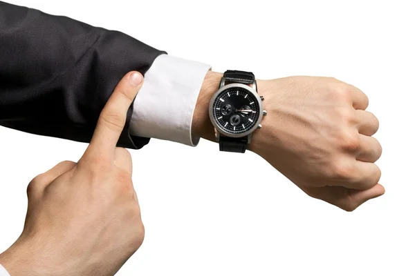 Homme d'affaires pointant vers montre à main — Photo