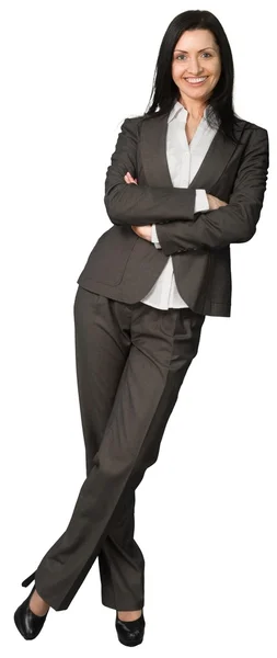 Бизнесмен, стоящая со сложенной рукой — стоковое фото