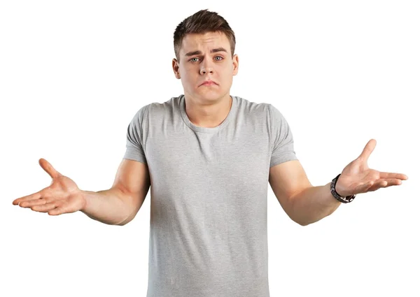 Young man shrugging shoulders — Stock Photo, Image