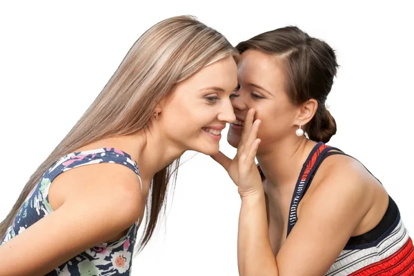 Mulher revelando segredo para seu amigo — Fotografia de Stock