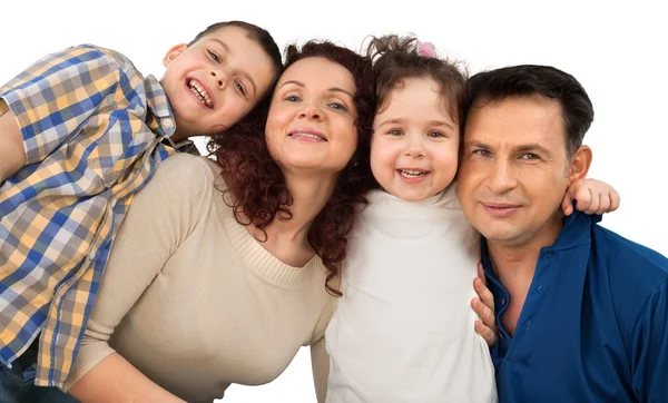 Feliz familia sonriente con niños —  Fotos de Stock