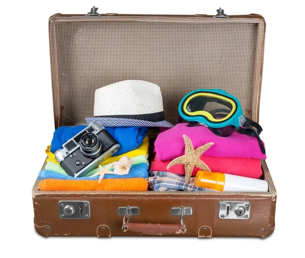 Vintage suitcase with traveling stuff — Stock Photo, Image