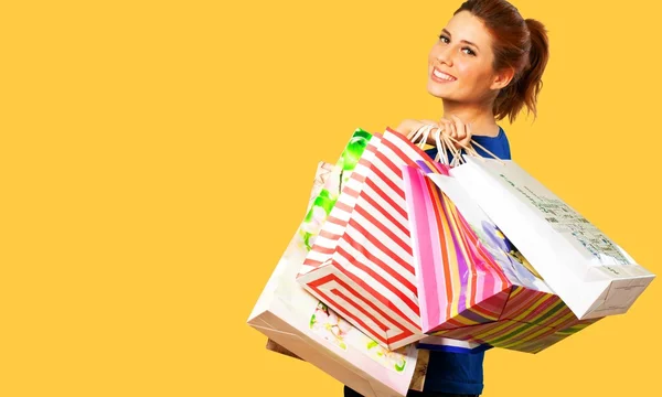 Mujer joven con bolsa de compras —  Fotos de Stock