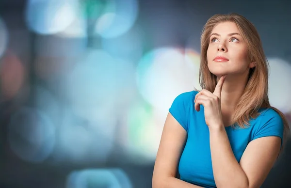 Pretty young thoughtful woman — Stock Photo, Image