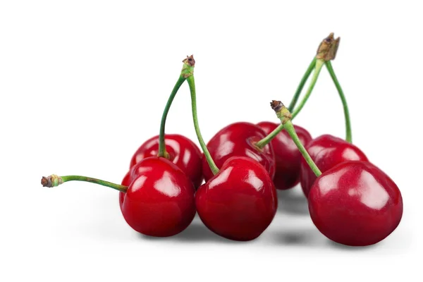 Cerezas rojas sobre blanco — Foto de Stock