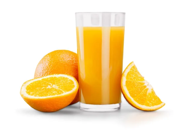 Glass of orange juice and oranges — Stock Photo, Image