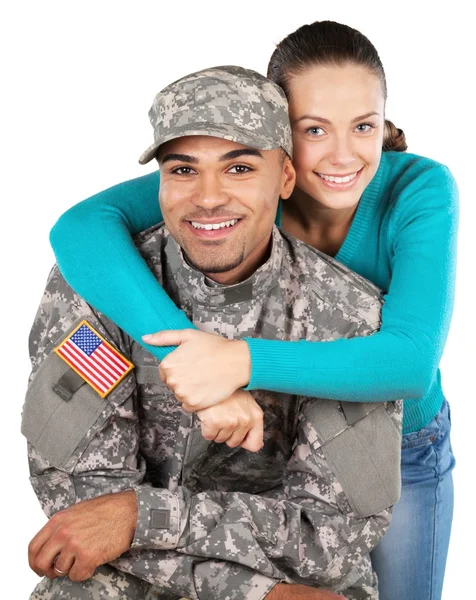 Smilende soldat med sin kone – stockfoto