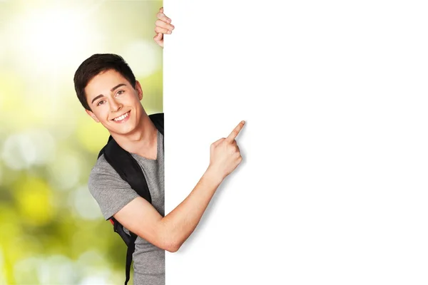 Adolescente apuntando en blanco signo blanco — Foto de Stock