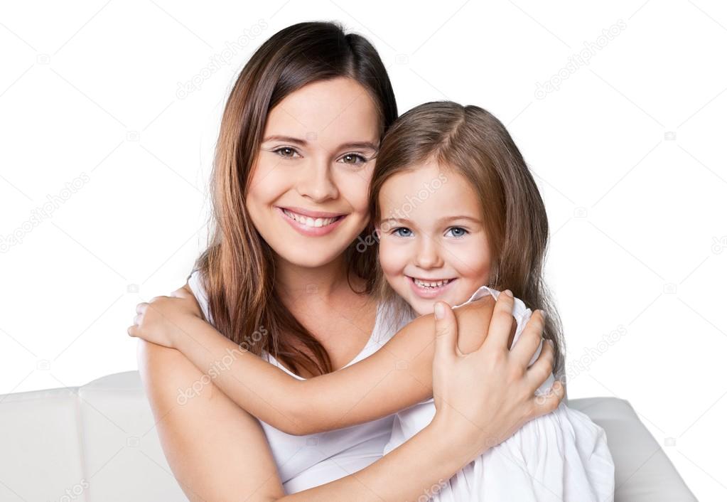 Mother and daughter hugging  