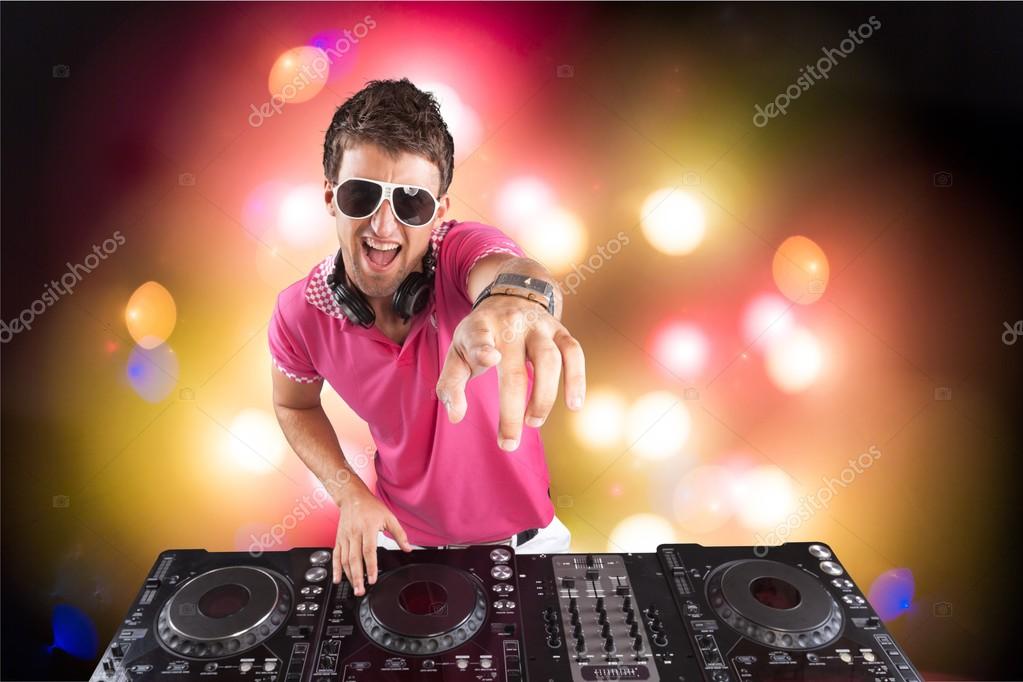Young DJ with headphones Stock Photo by ©billiondigital 118523304