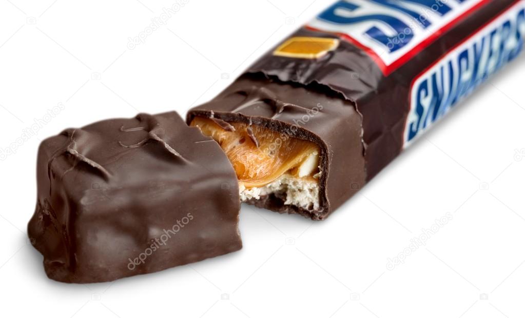 KHERSON, UKRAINE - NOVEMBER 11, 2014: Snickers chocolate bar isolated on white background.