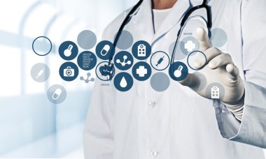 Tıbbi simge ve genç doktor 
