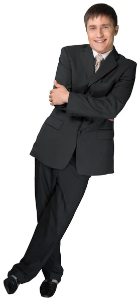 Young businessman standing on white — Stock Photo, Image