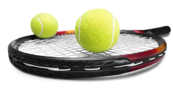 Tennisballen en racket op achtergrond. — Stockfoto