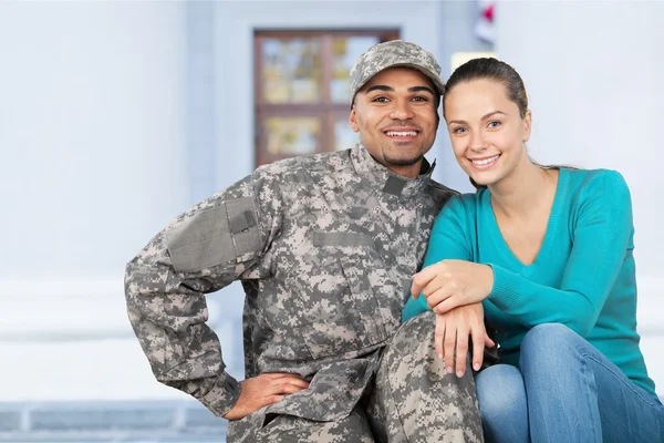 Smiling soldier with his wife — Stock Photo, Image