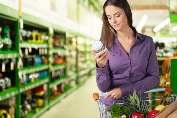 Woman with cart shopping — Stock Photo, Image