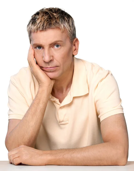 Middle aged man in thoughtful pose — Stock Photo, Image