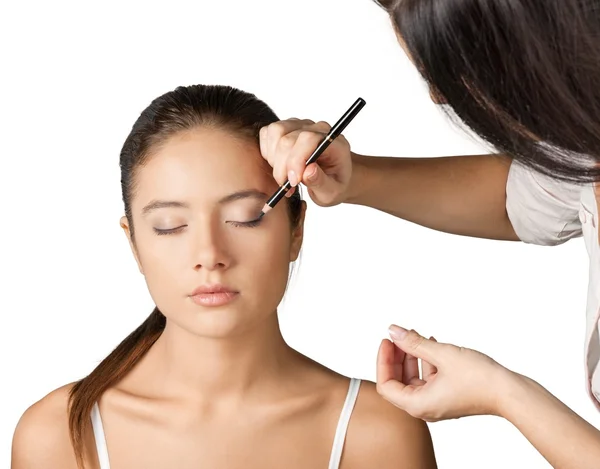 Make-up-Artist macht Make-up Mädchen — Stockfoto