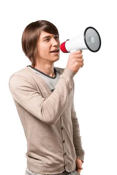 Handsome young man using megaphone — Stock Photo, Image