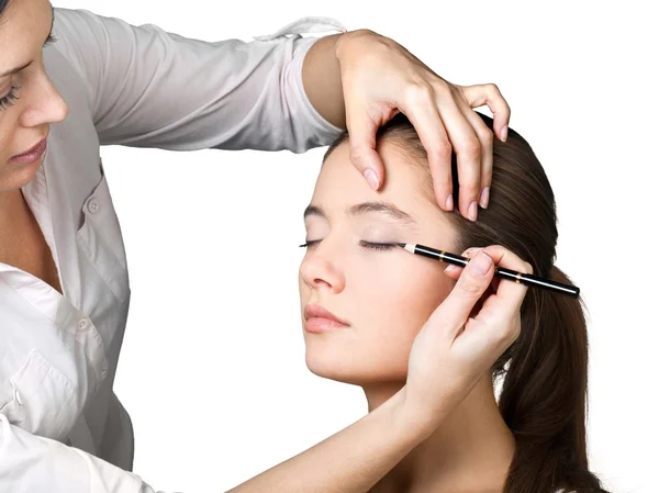 Make-up-Artist macht Make-up für Mädchen — Stockfoto