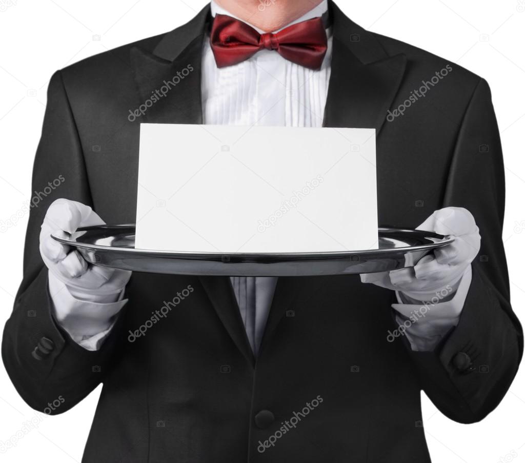 waiter holding a note card 