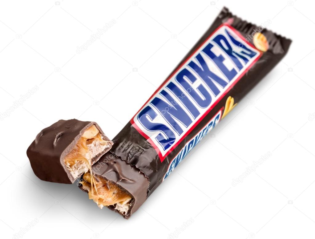 KHERSON, UKRAINE - NOVEMBER 11, 2014: Snickers chocolate bar isolated on white background.