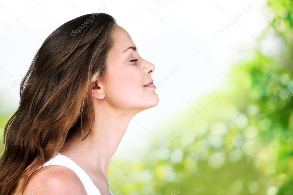 beautiful woman breathing outdoor